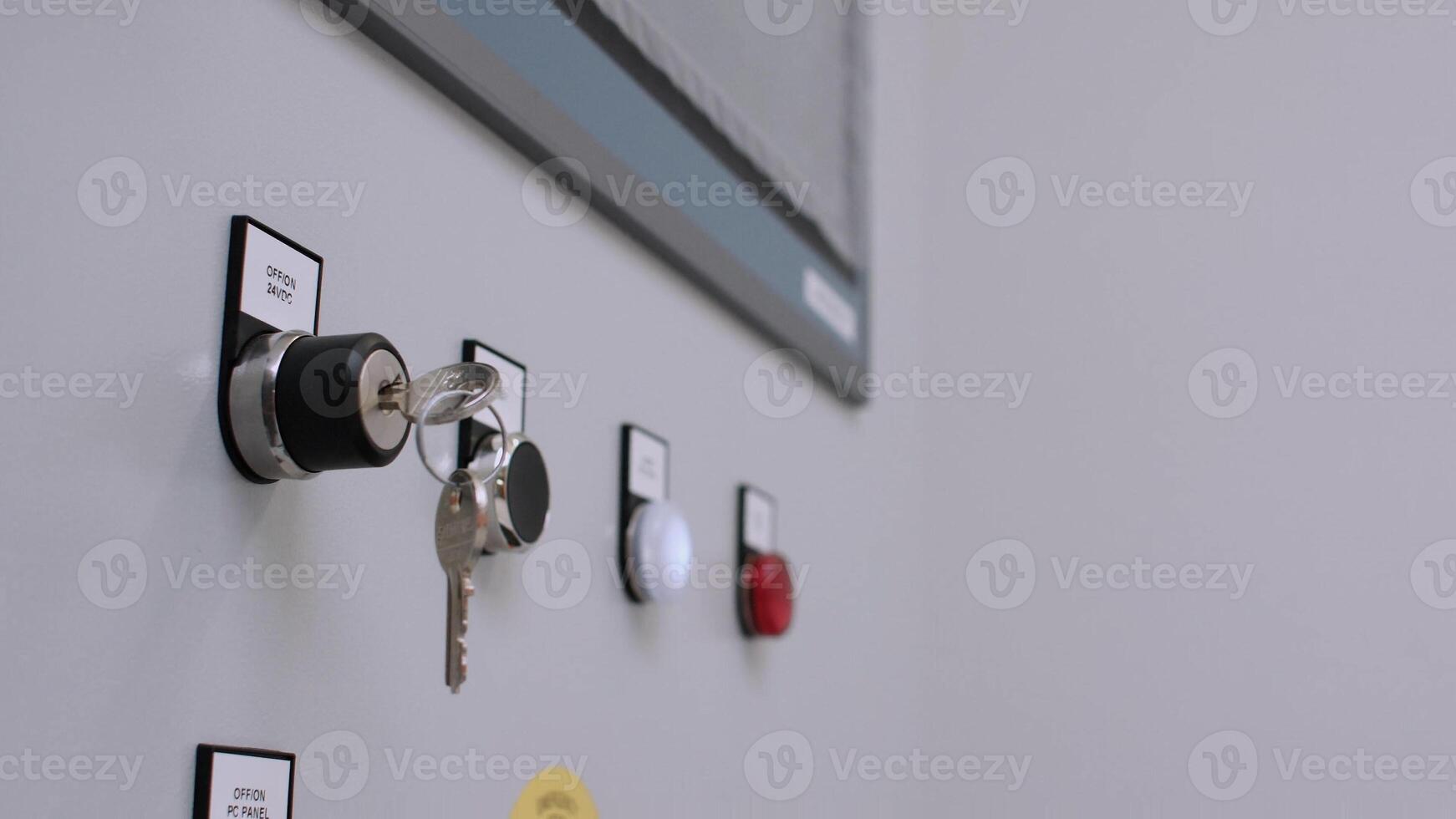 Stop Red Button and the Hand of Worker About to Press it. emergency stop button. Big Red emergency button or stop button for manual pressing. photo