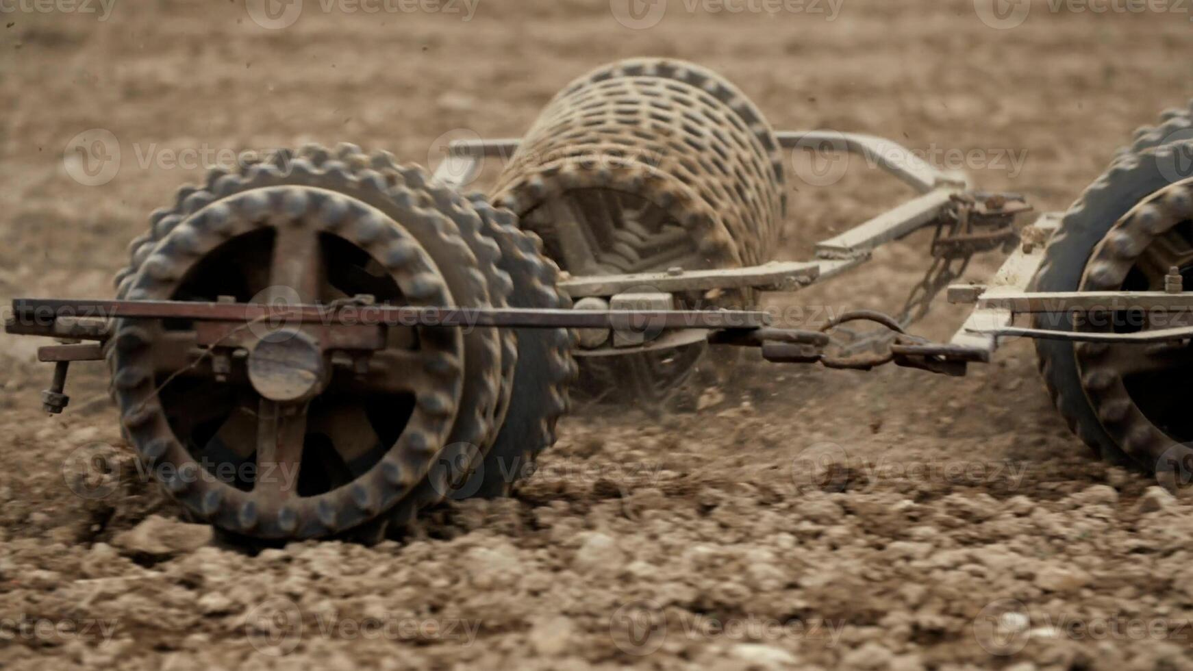 Track shoe of the excavator with soil in the background. photo