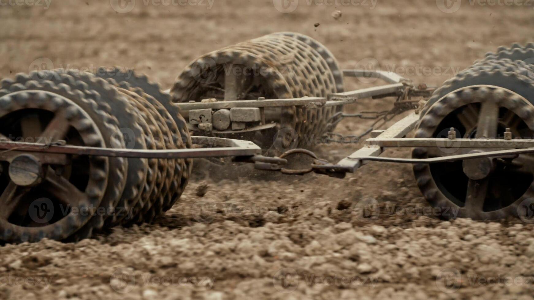 Track shoe of the excavator with soil in the background. photo
