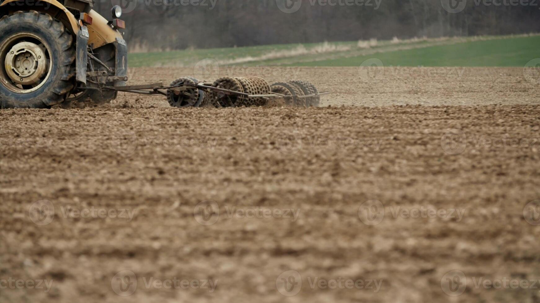 Tractor, that sowing a field. photo