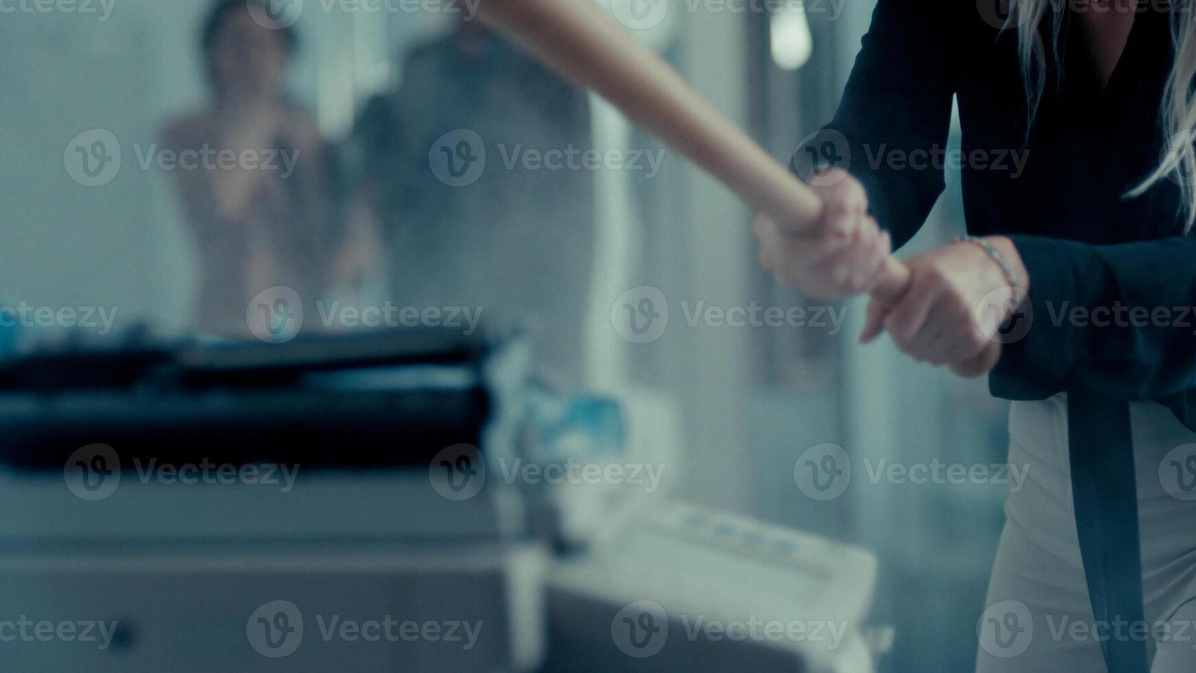 angry women break xerox machine in office photo
