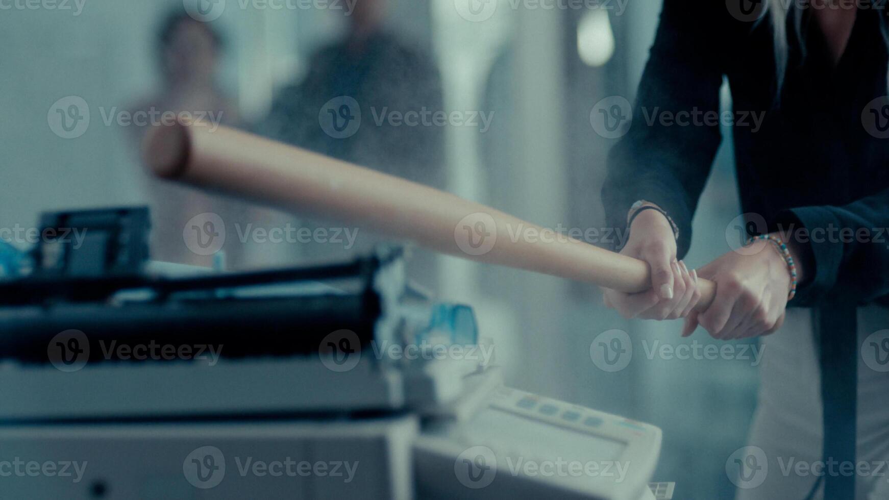 angry women break xerox machine in office photo