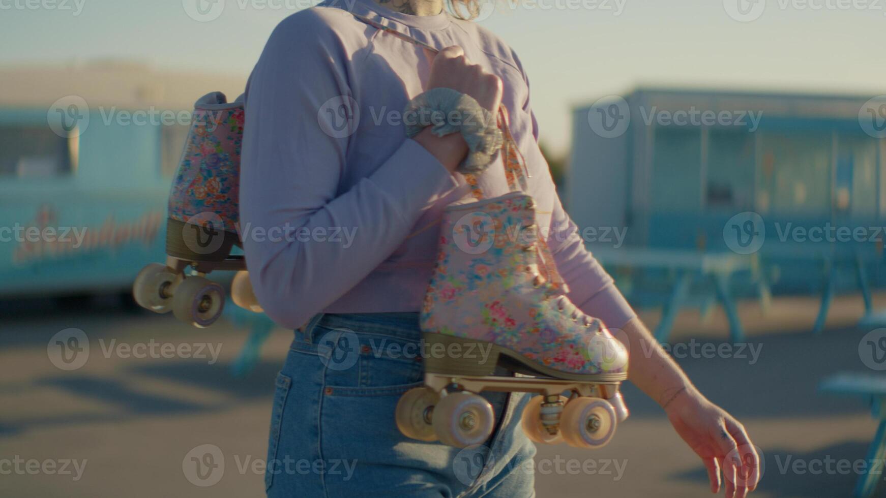 Rollerskate, mockup and back with a woman at a skatepark for fun, recreation or training outdoor. Fitness, skating and hobby with a female skater walking outside on a ramp for sports practice photo
