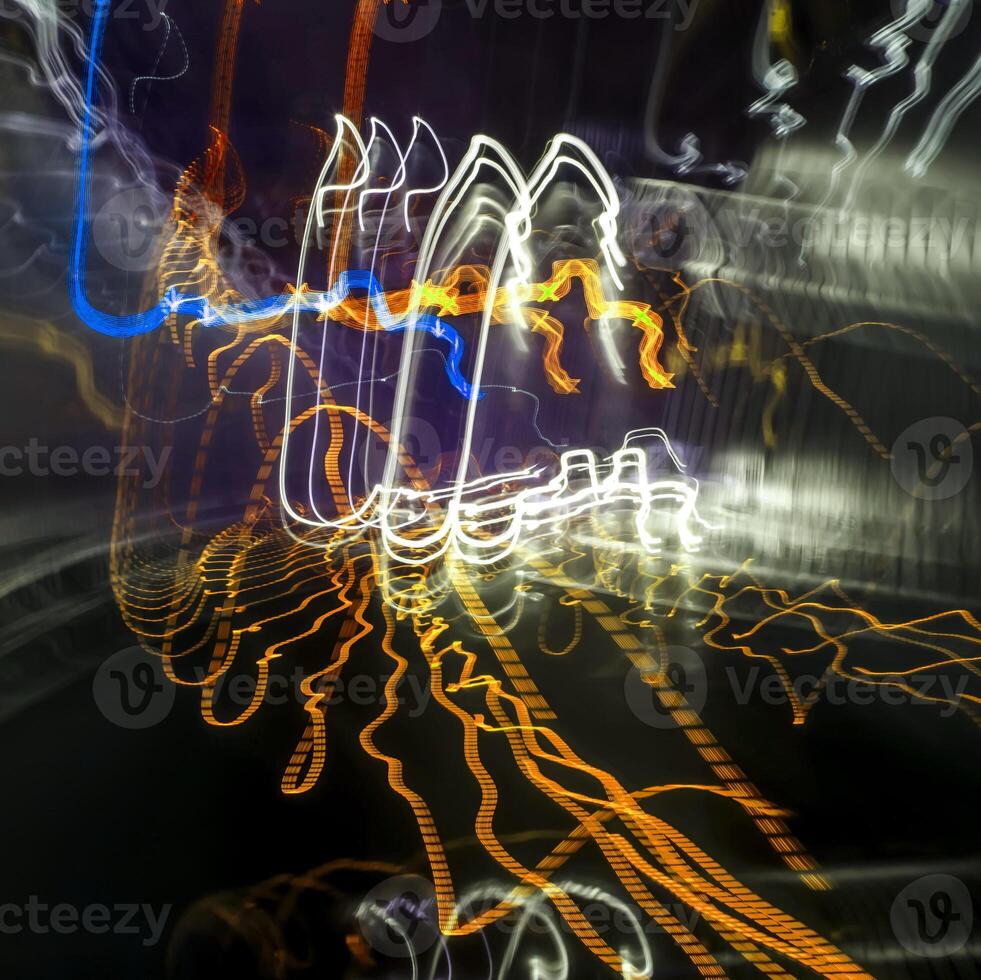 Blue and orange lights background, blurry abstract lights, square composition. photo