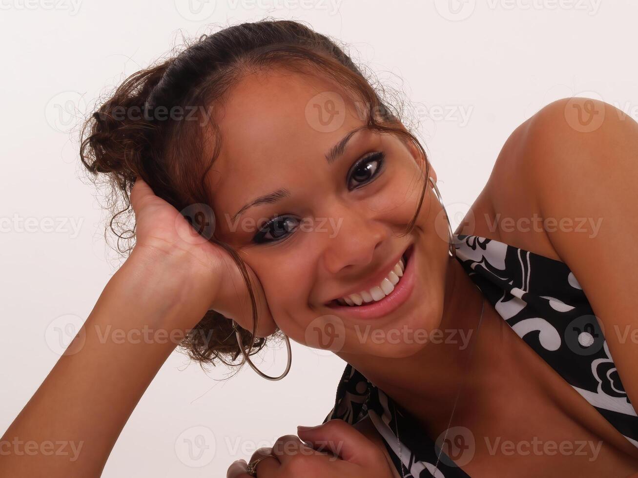 Young Caucasian Teen Portrait Reclining On White Background photo
