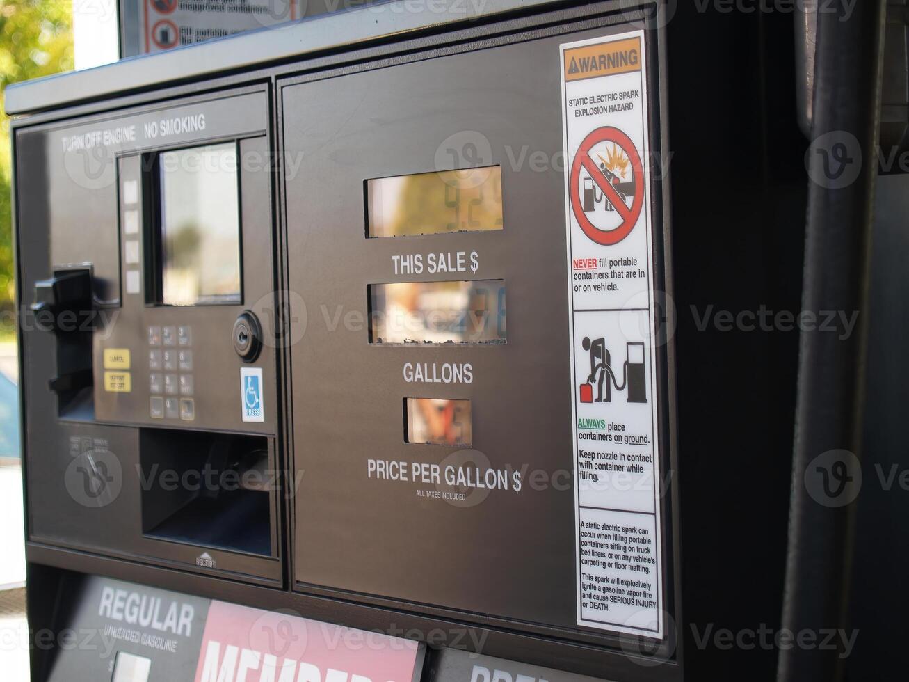 Tight Oblique Shot Of Gas Pump With Reflections Obscuring Price photo