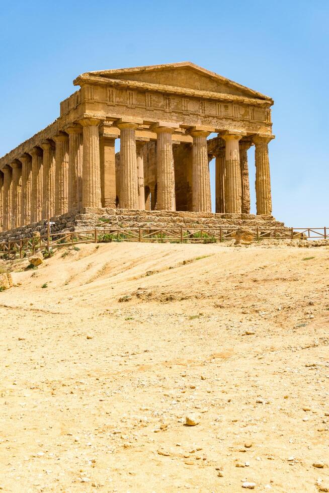 Agrigento, Italy-May 10, 2022-The Temple of Concordia inside the valley of the temples, an archaeological park near Agrigento during a sunny day photo