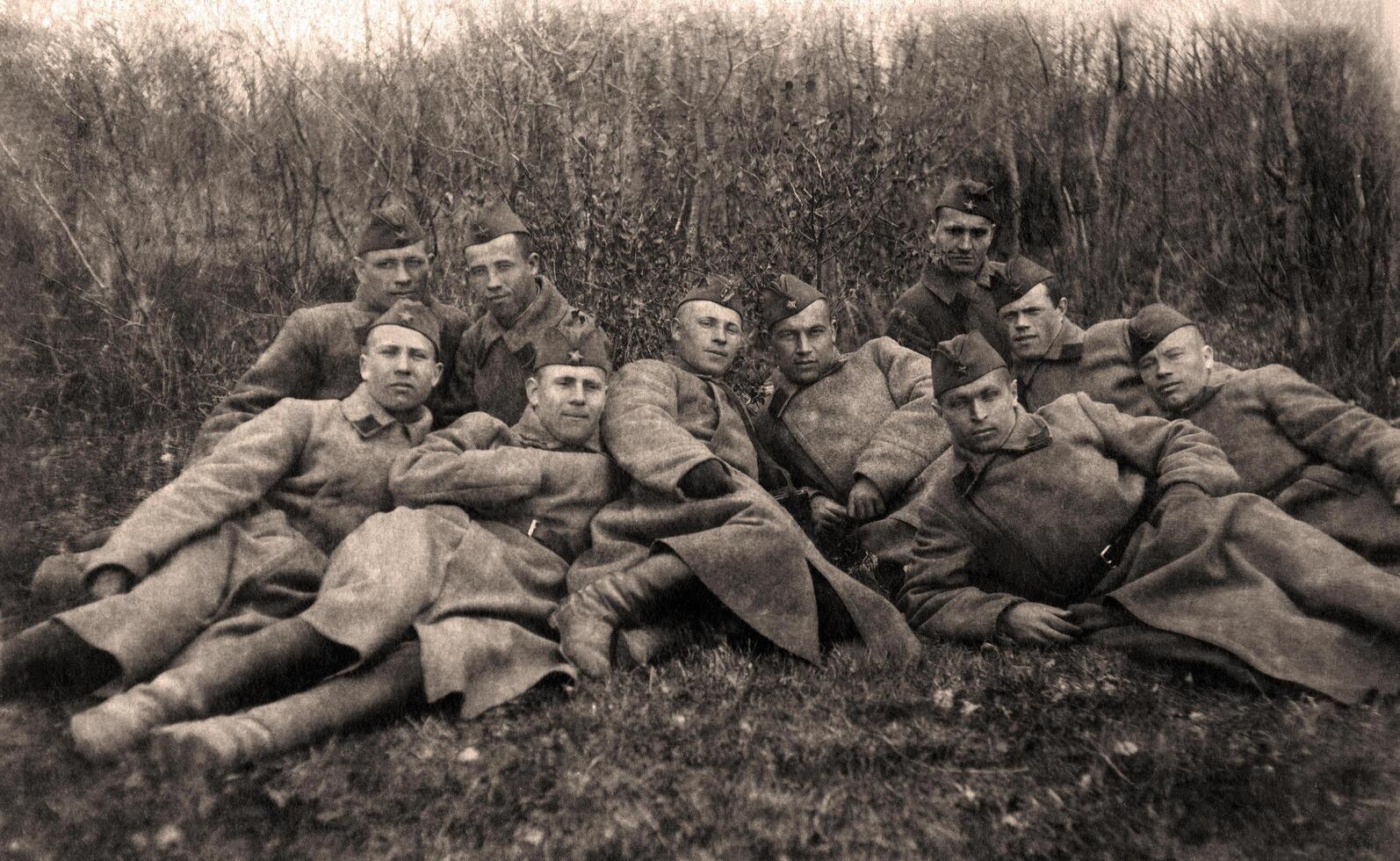 Ukraine, USSR - circa autumn 1941 Soviet soldiers in the forest on rest between battles photo