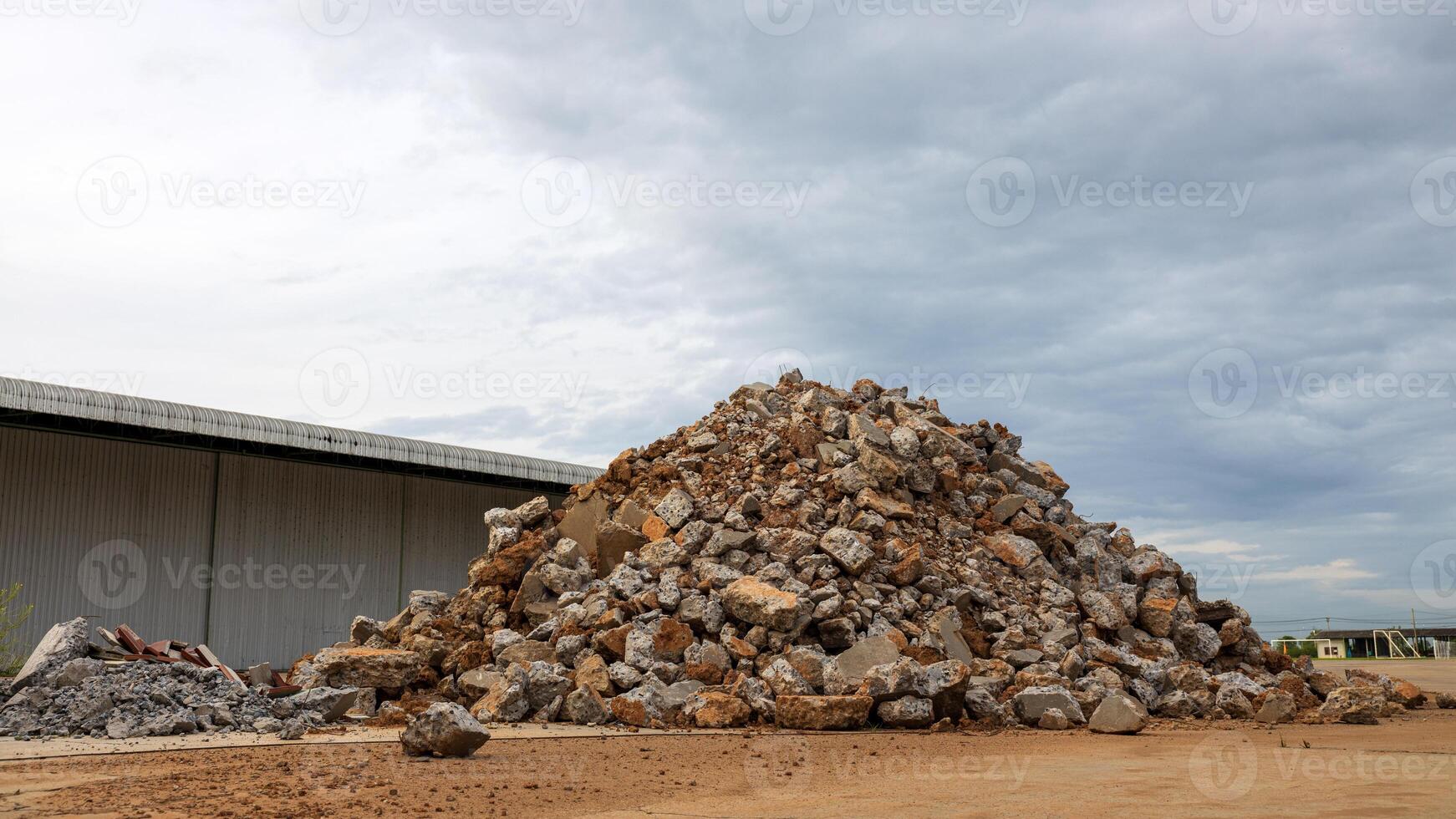 Close-up low angle view of chunks of concrete cement that were removed. photo