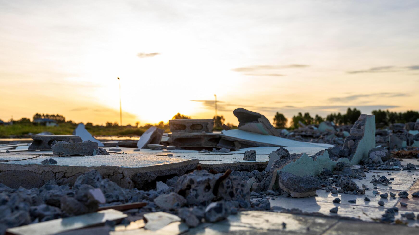 Close-up low angle view of a pile of rubble of a brick wall. photo