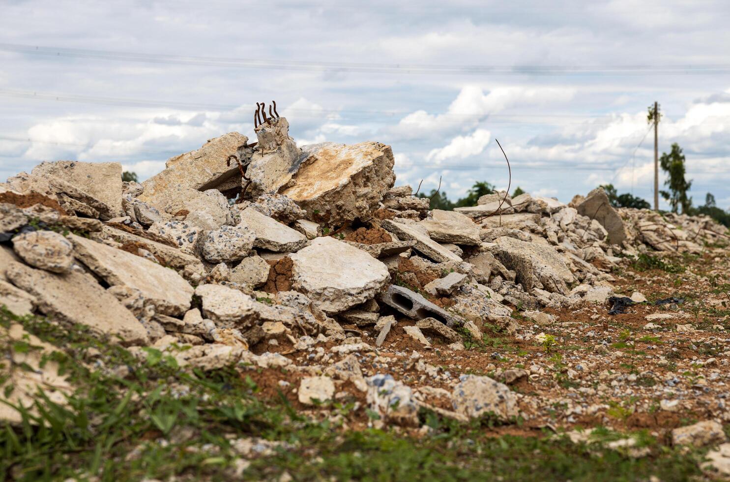 A low angle view of the many concrete ruins that have been demolished. photo