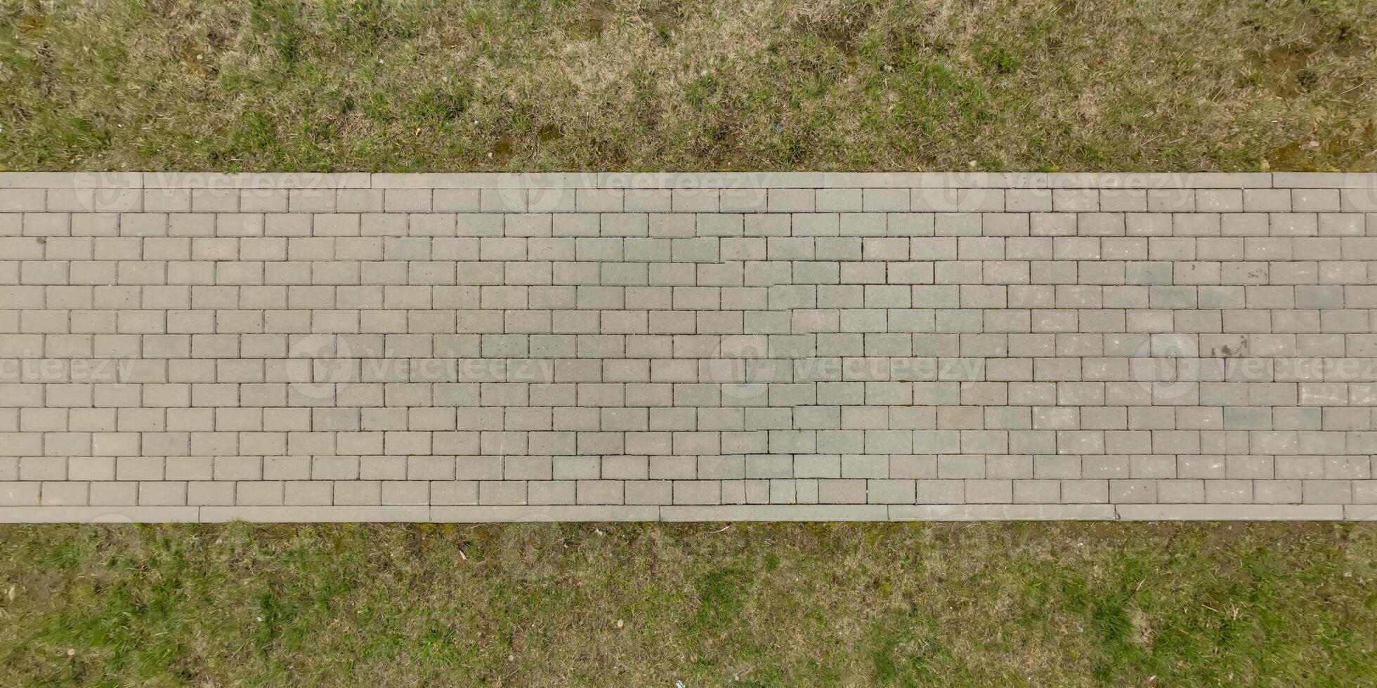 top view of surface of paving slabs and pedestrian footpath photo