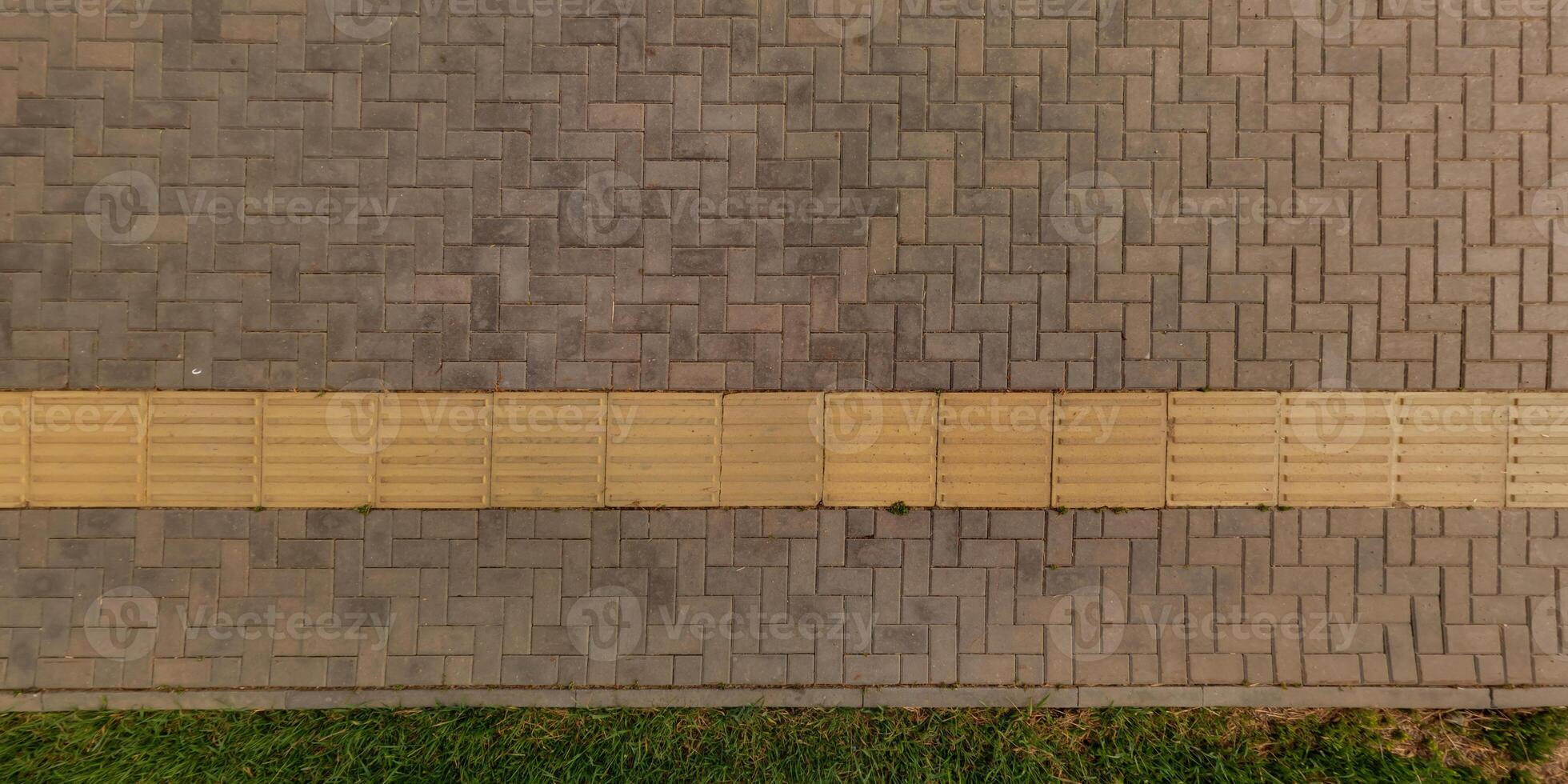 top view of surface of paving slabs and pedestrian footpath photo