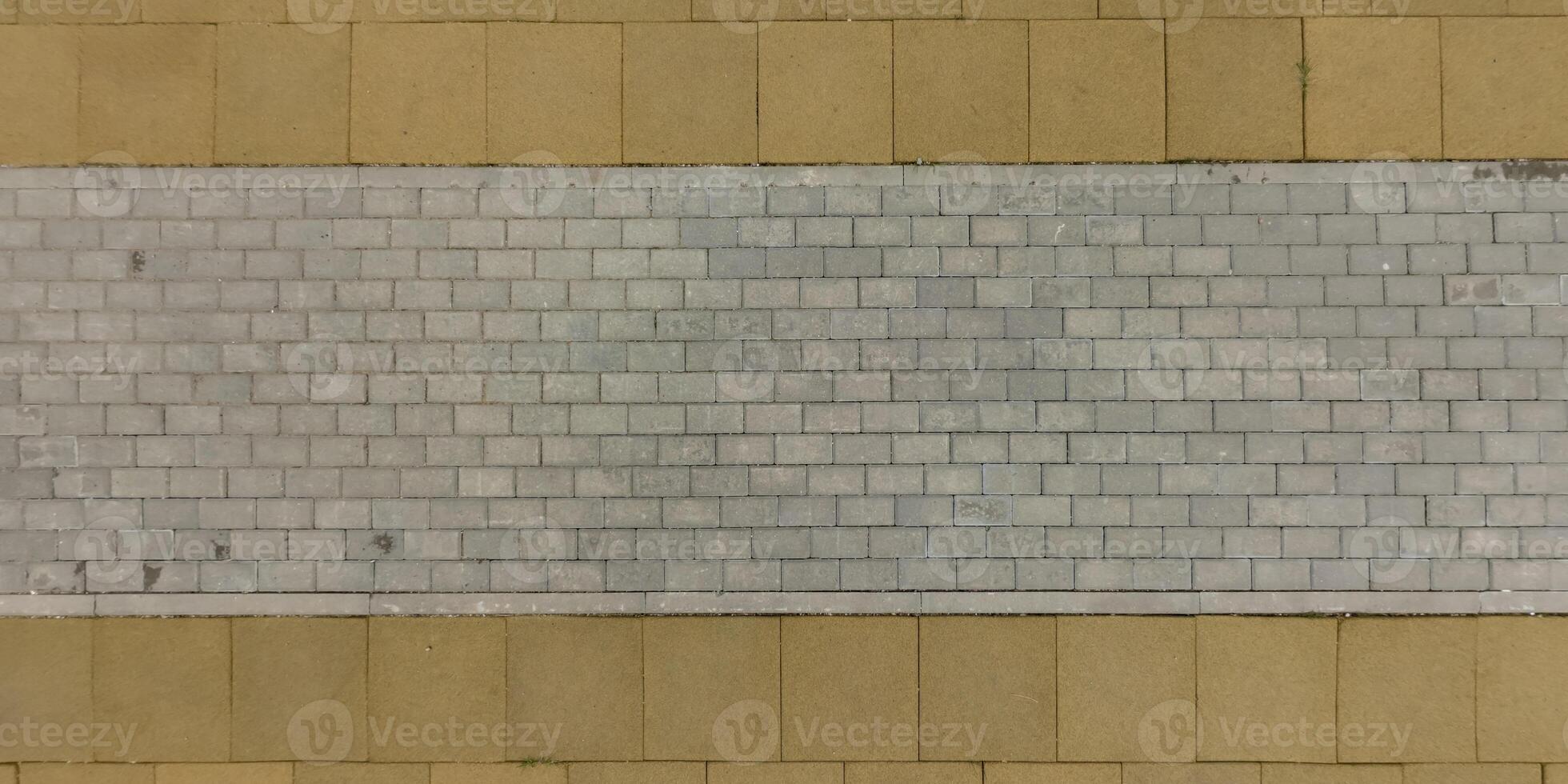top view of surface of paving slabs and pedestrian footpath photo