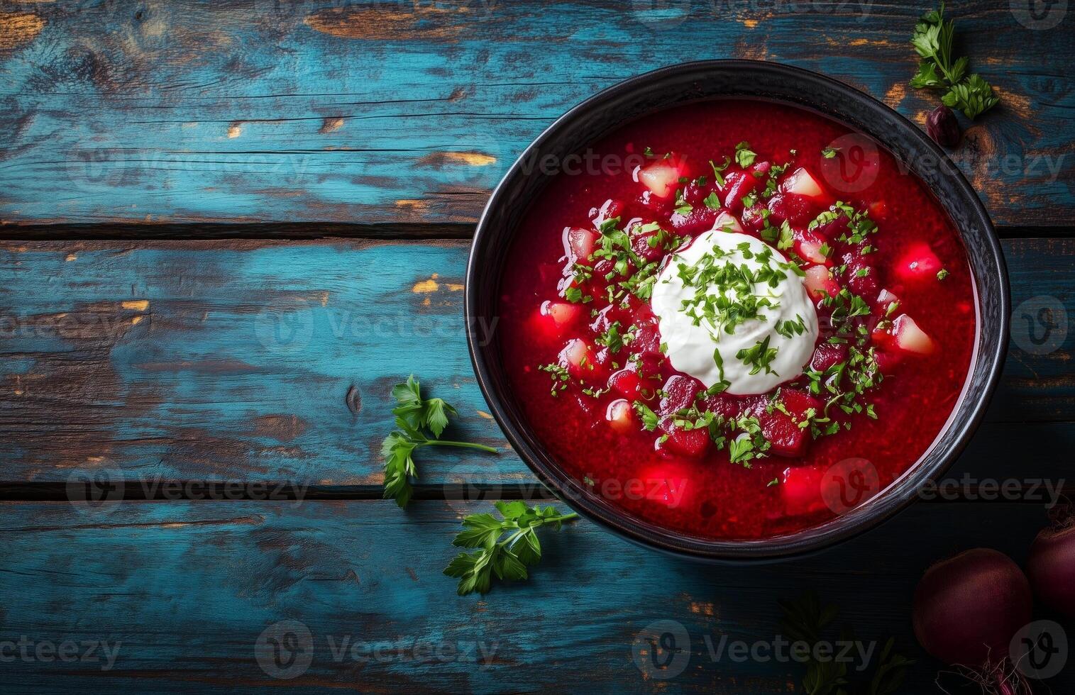 Borscht is a red beet soup with vegetables, served with sour cream in a bowl photo