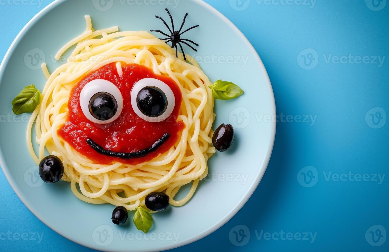 Spooky Halloween pasta with ketchup and a spider web set against a blue background photo