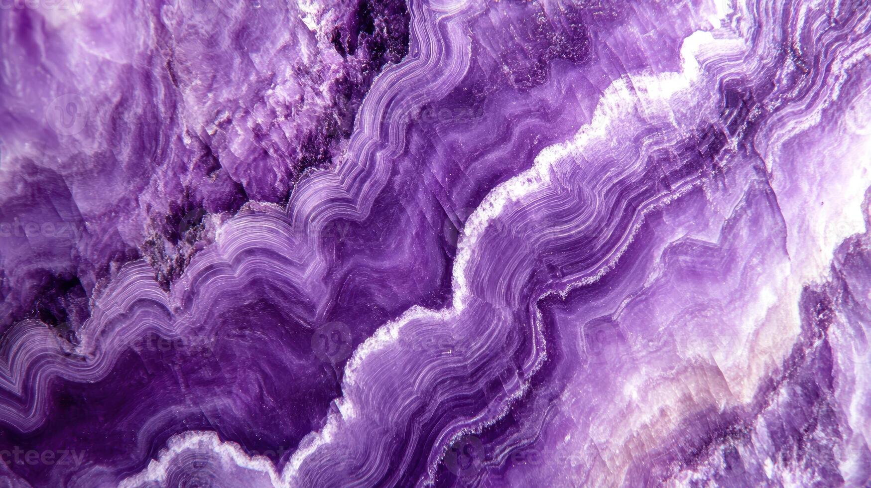 Close-up of charoite crystal highlighting its rich purple hues and intricate patterns. photo