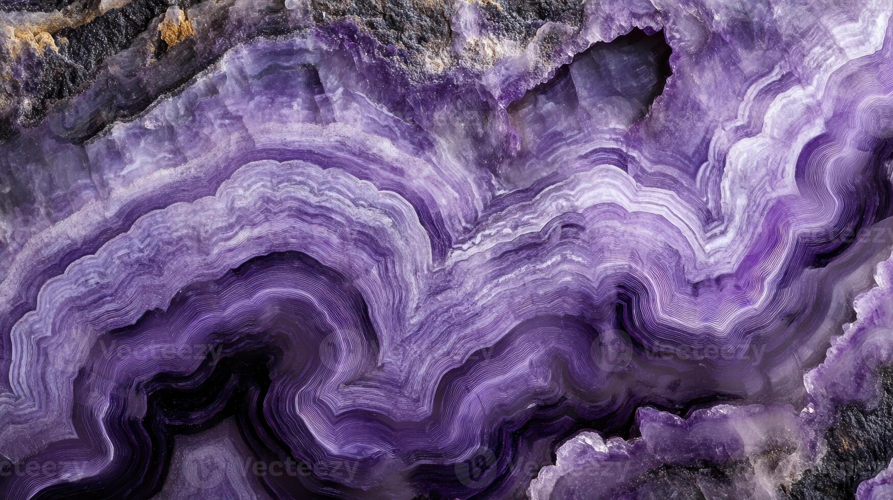 Close-up of charoite crystal with swirling purple patterns photo