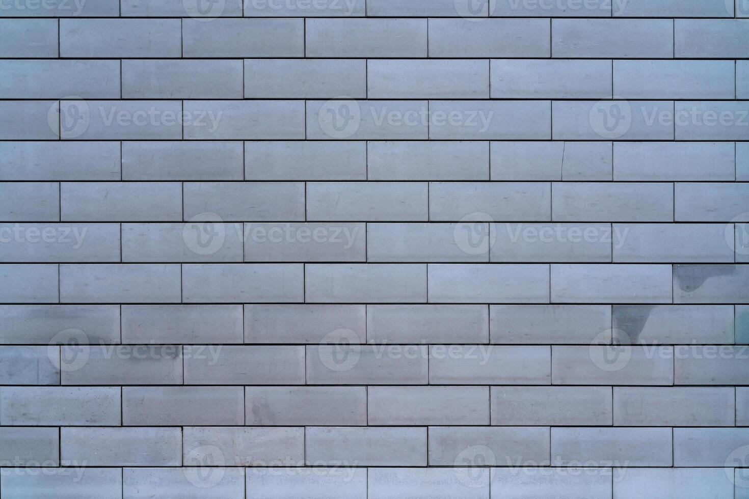 Brick wall of the building. Designer building background. photo