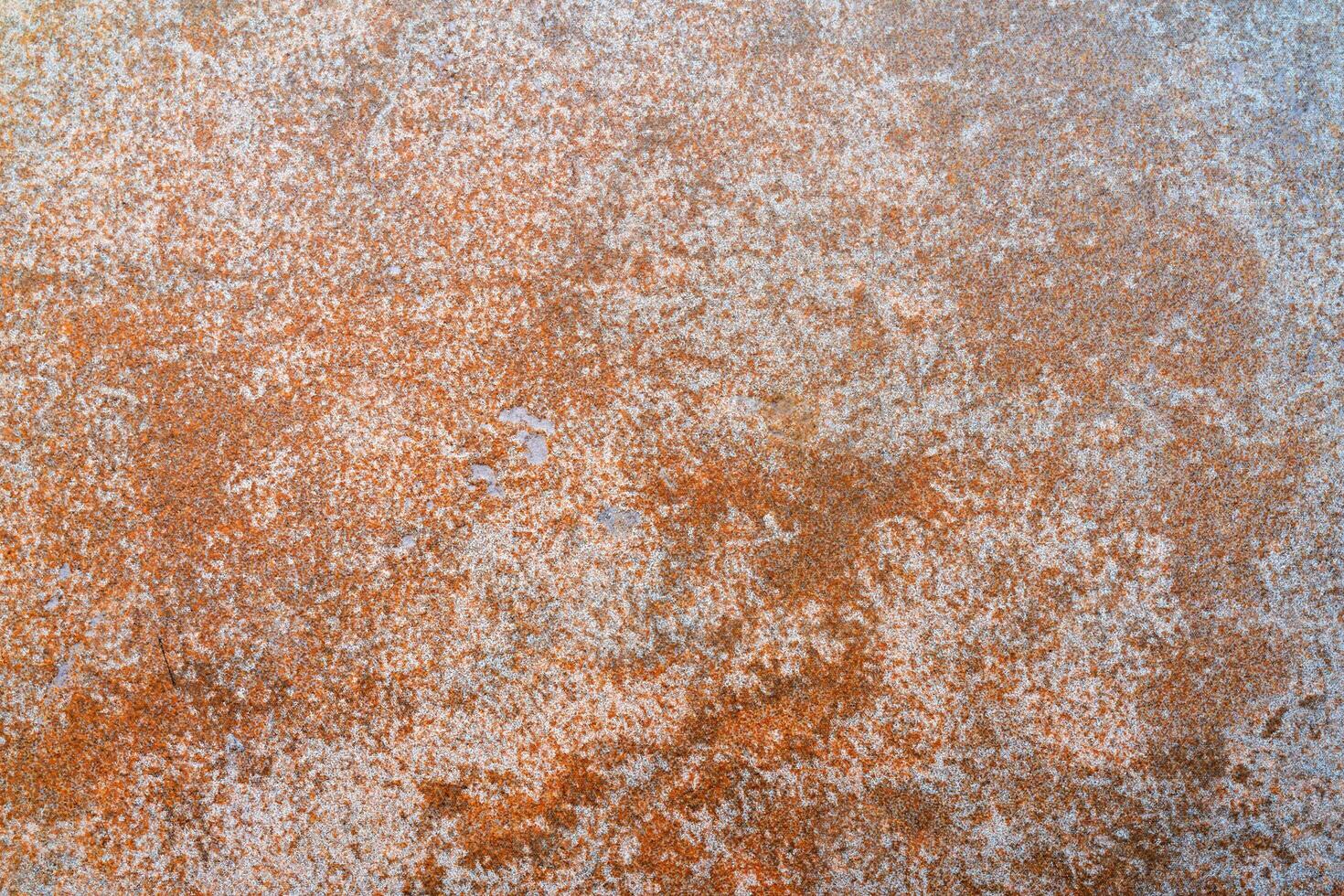 Rusty orange metal texture. Abstract technical background. photo