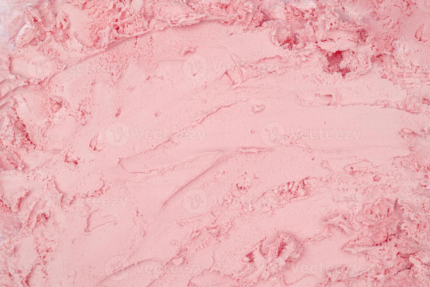 Strawberry ice cream texture. Top view. Delicious cool treat. photo
