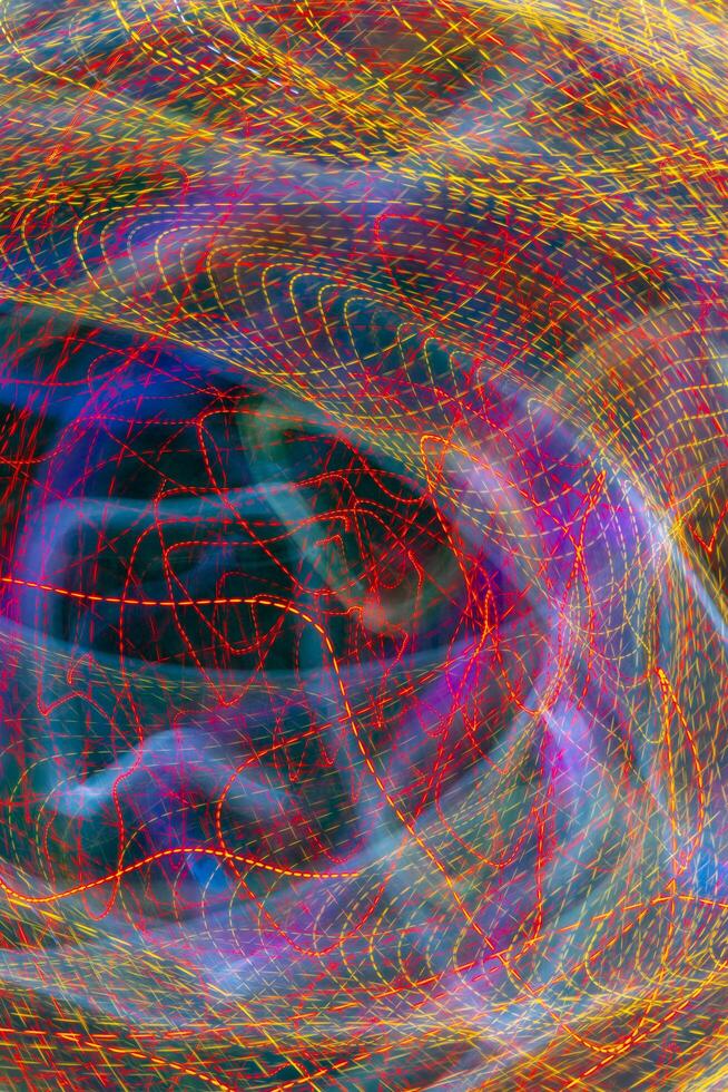 A pattern of glowing lines of light. Abstract design background. photo