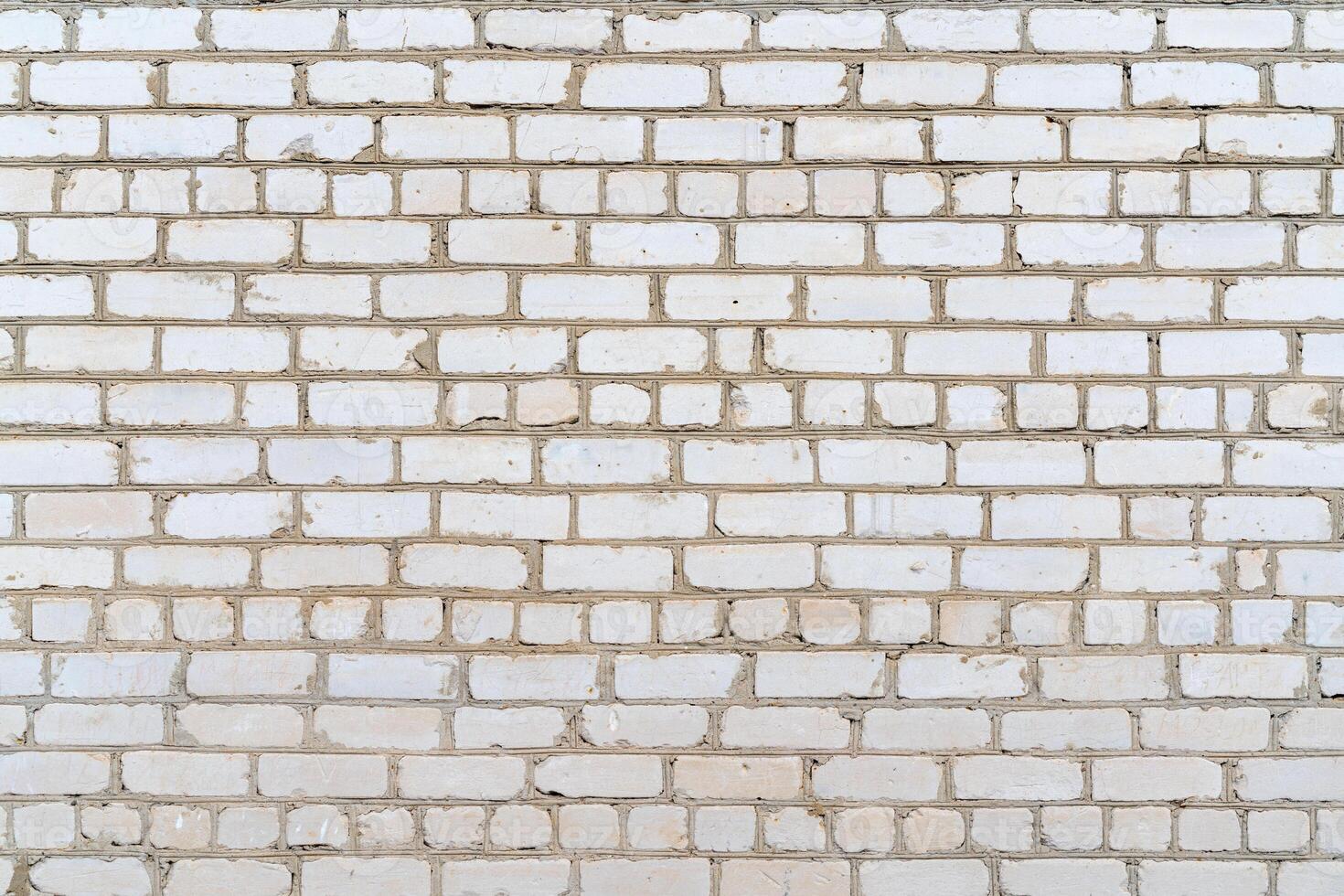 Old white brick wall. Construction brick vintage background. photo