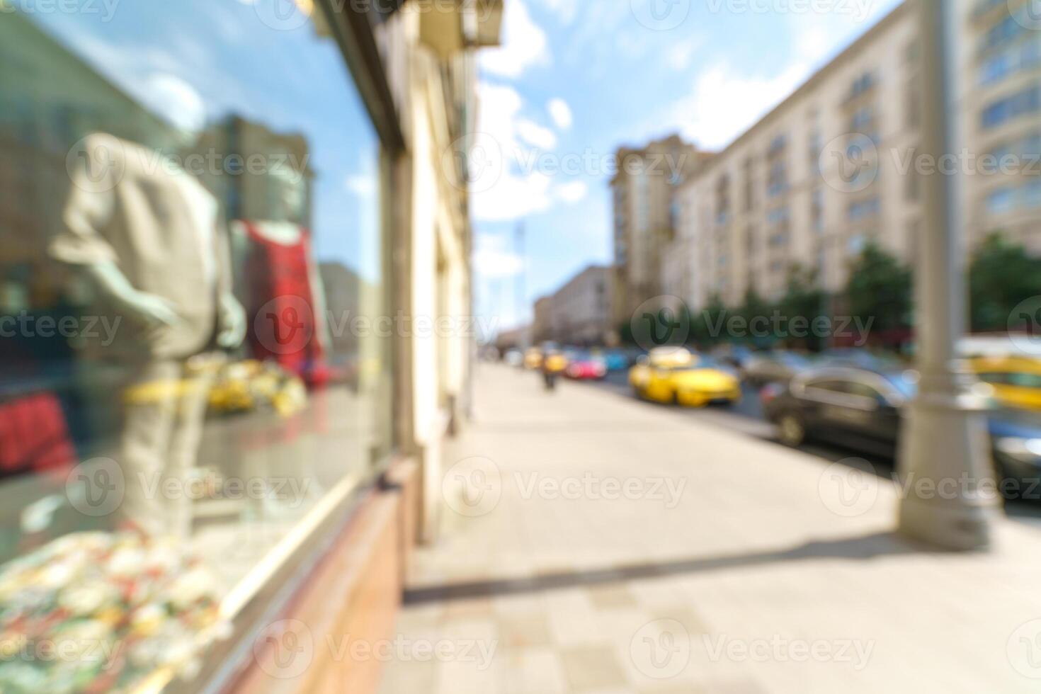 Blurred background of a city street. Blurred photo of a modern city.