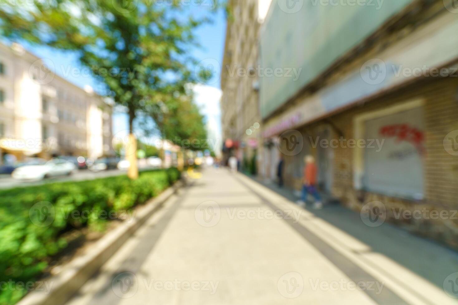 Blurred background of a city street. Blurred photo of a modern city.