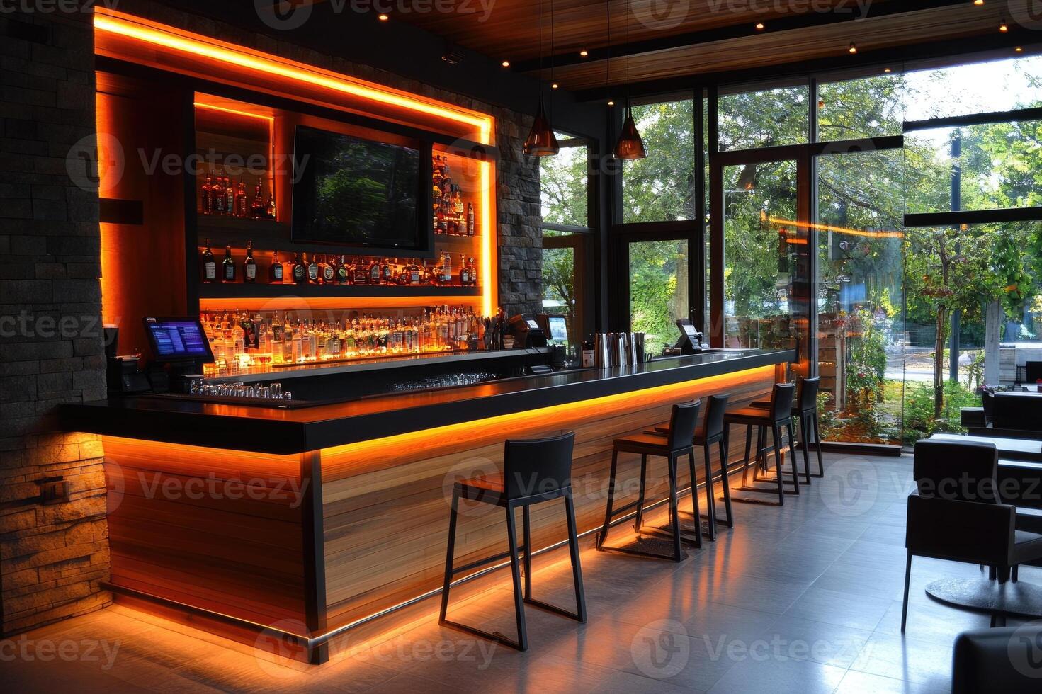 Modern and empty bar with orange lights shining at night photo
