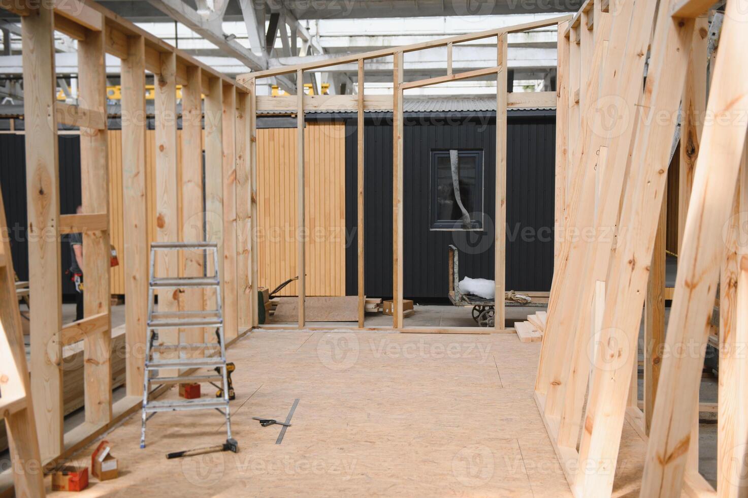 Production of new wooden modular houses. Construction site photo