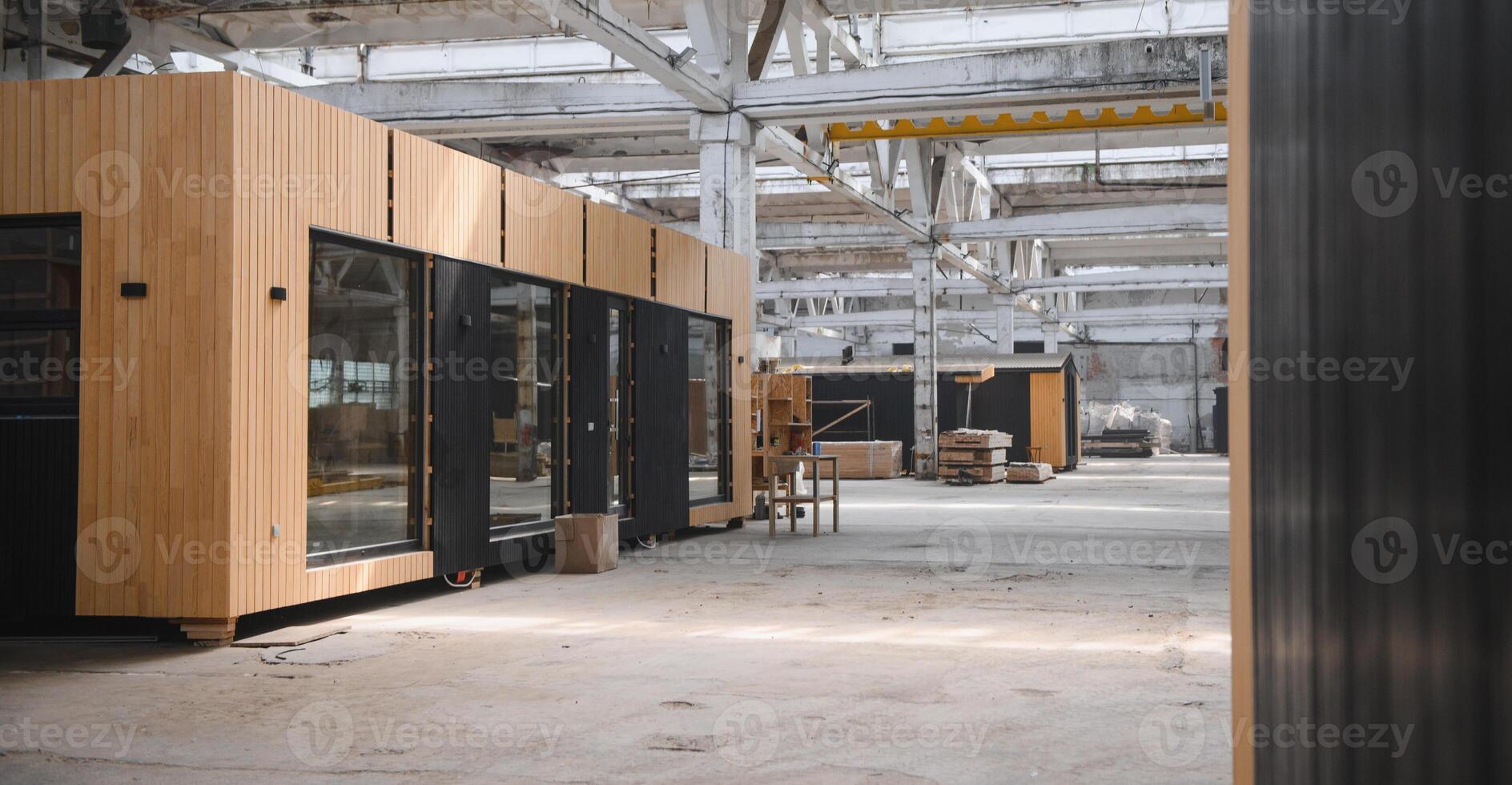 Newly built single storey prefabricated modular building. Prefabricated mobile wooden house at construction site photo
