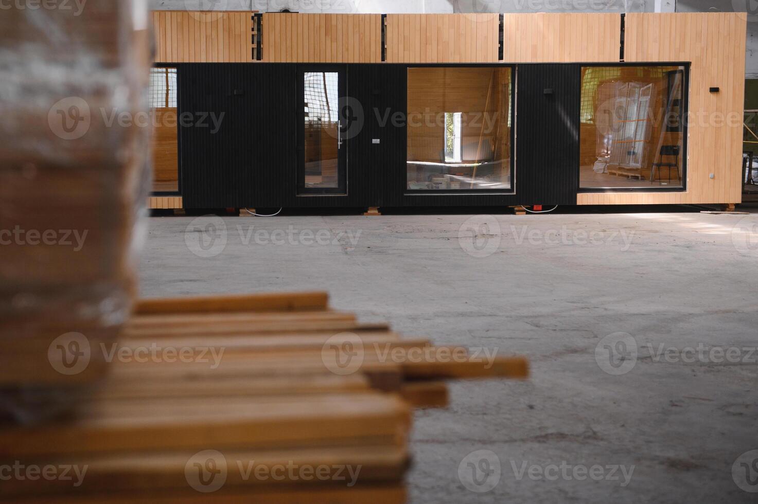 A new wooden modular prefabricated house inside in manufacturing facility photo