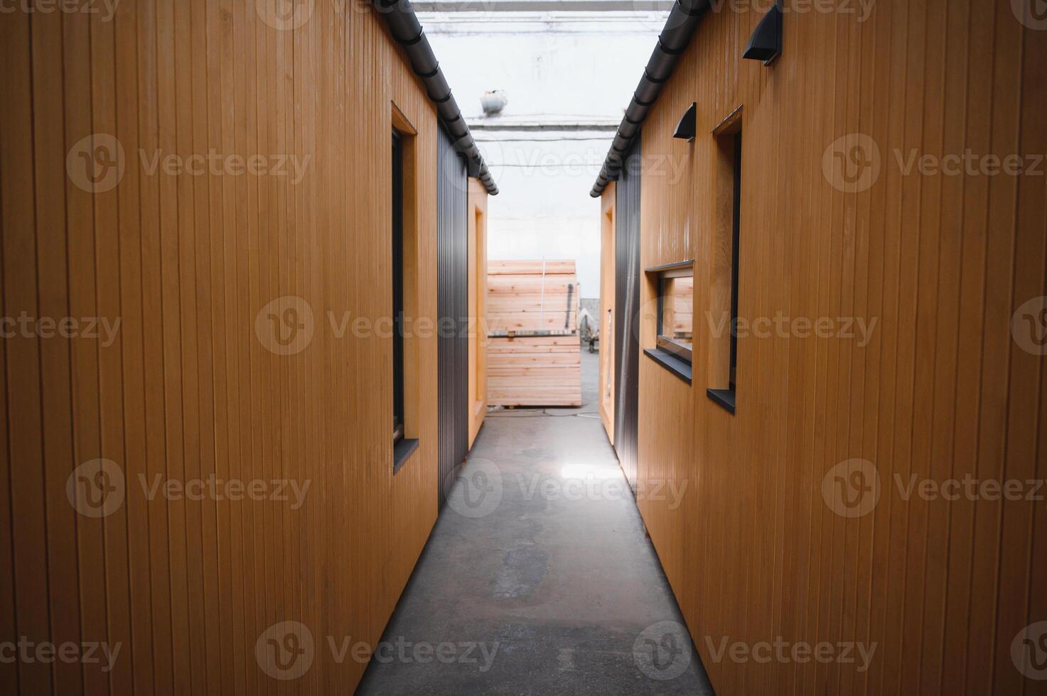 Newly built single storey prefabricated modular building. Prefabricated mobile wooden house at construction site photo