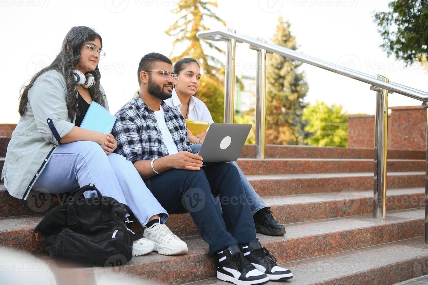 Group of Indian or Asian college students in the campus photo
