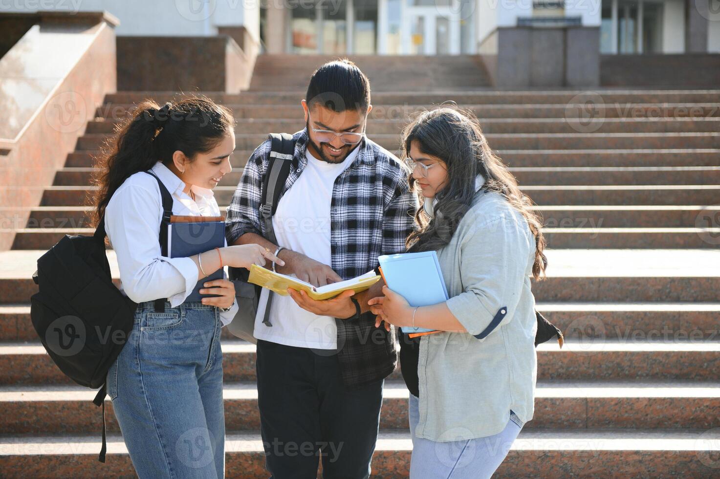 Group of Indian or Asian college students in the campus photo