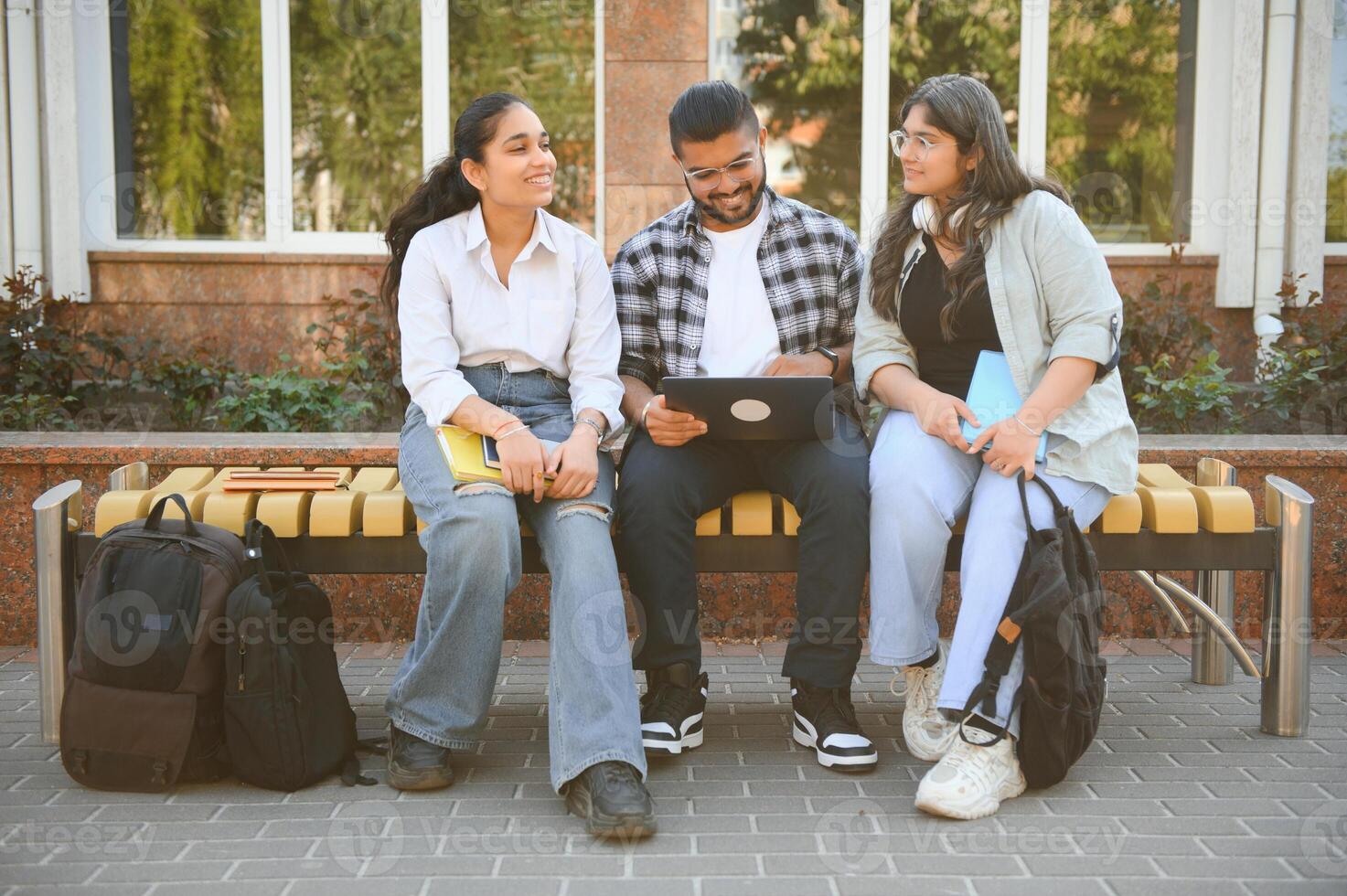 Group of Indian or Asian college students in the campus photo