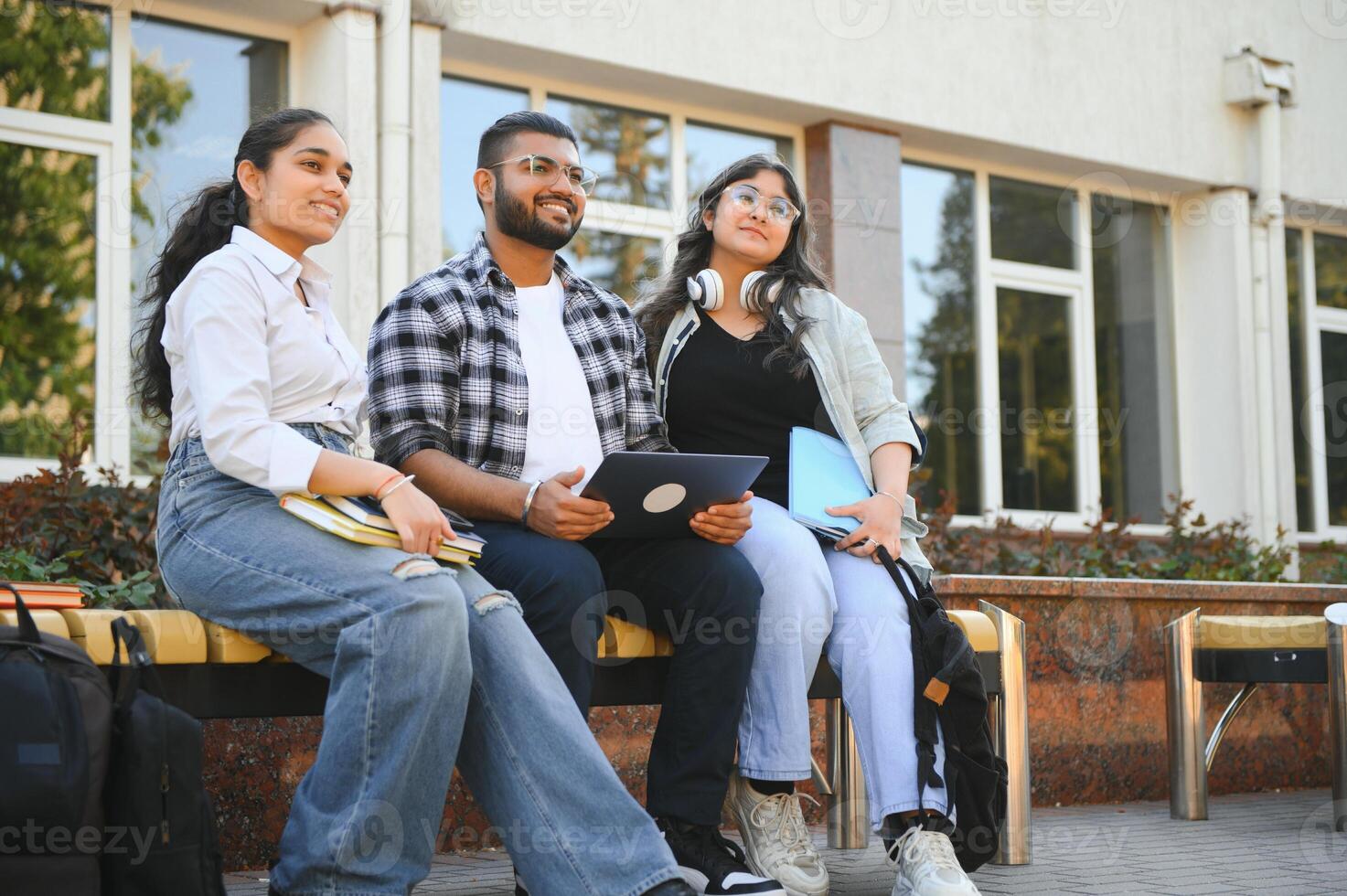 Group of Indian or Asian college students in the campus photo