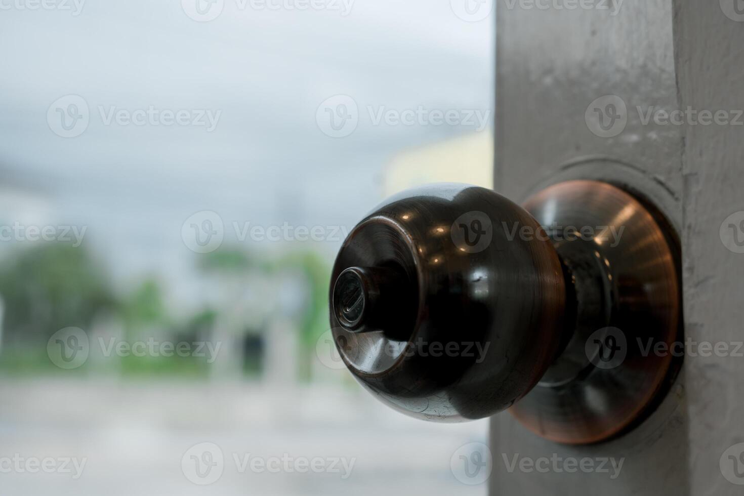 Open door knob or open the door to the outside. photo