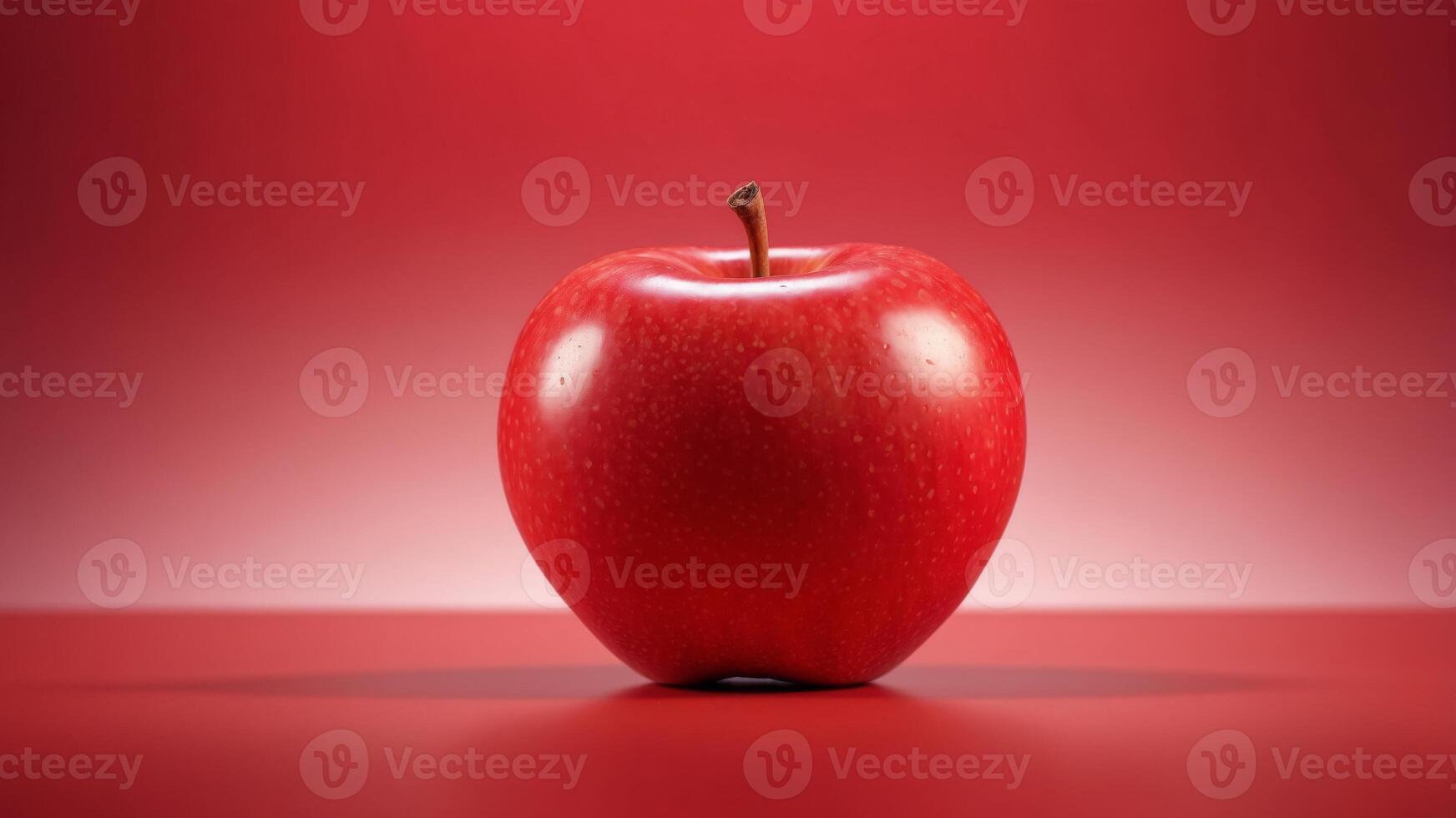Single Red Apple on Bright Red Background. photo