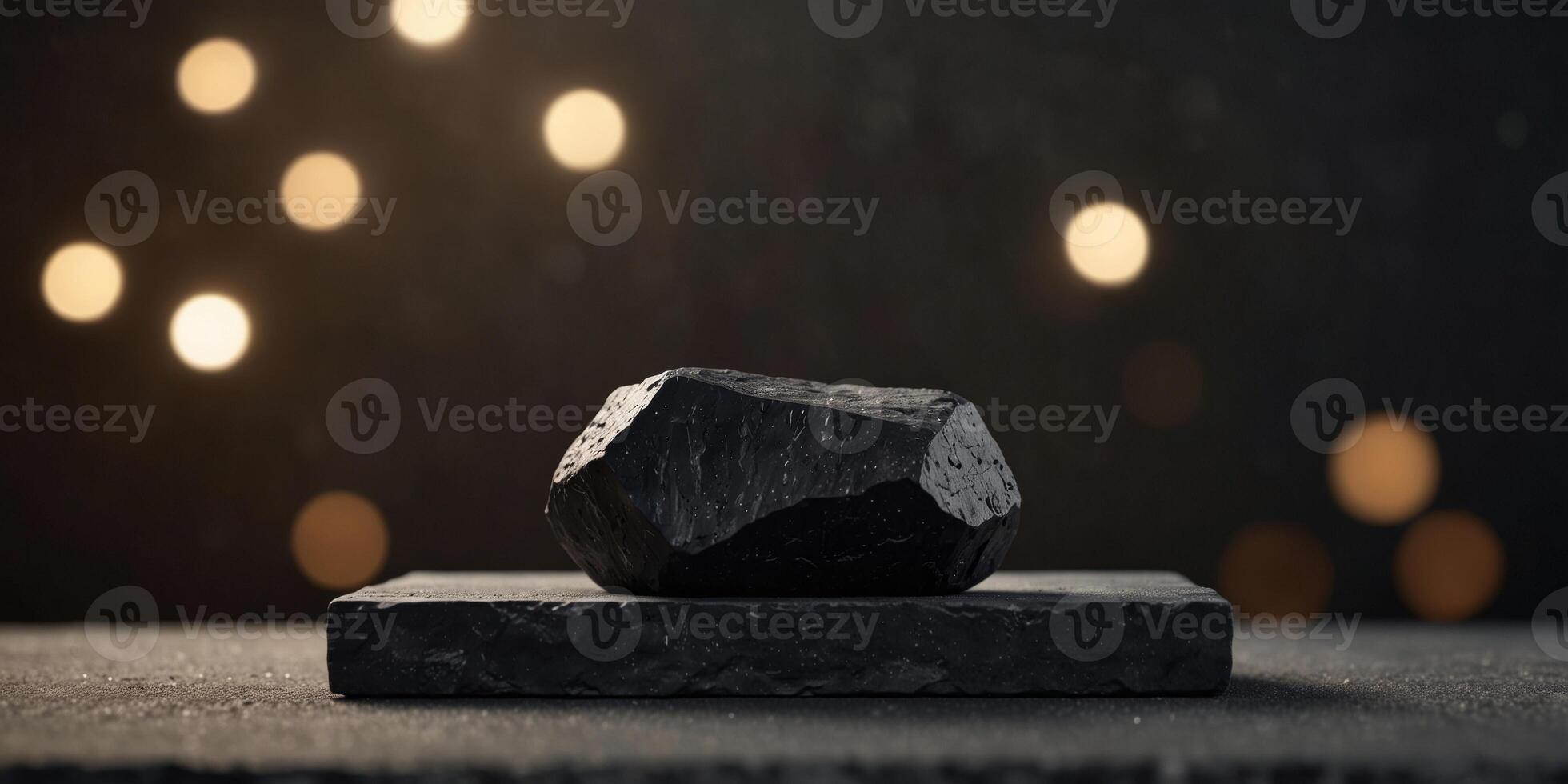 Minimalist Black Geometric Rock Podium with Subtle Lighting for Marketing Visuals. photo