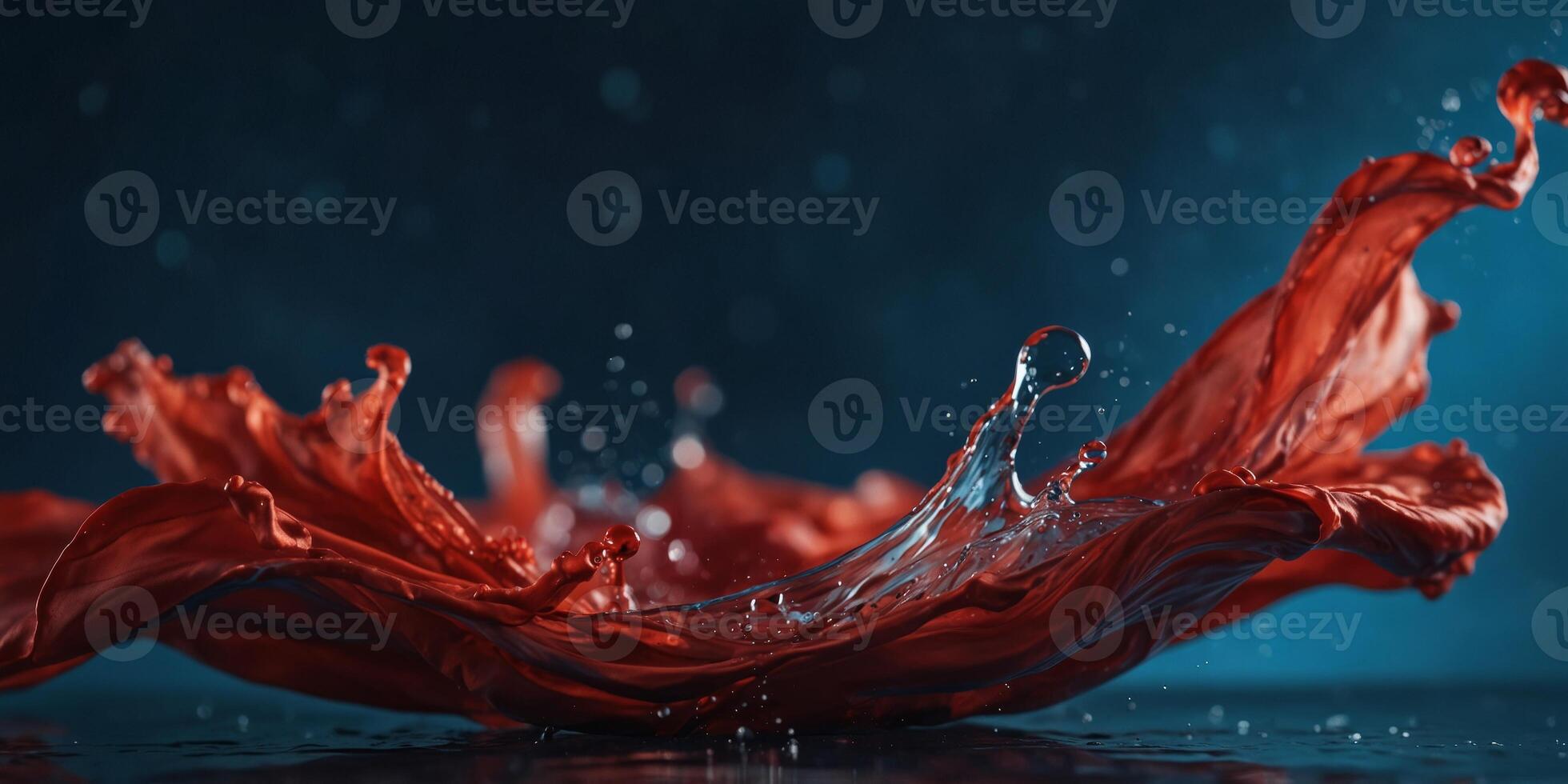 Dynamic splash of red silk in water on blue background. photo