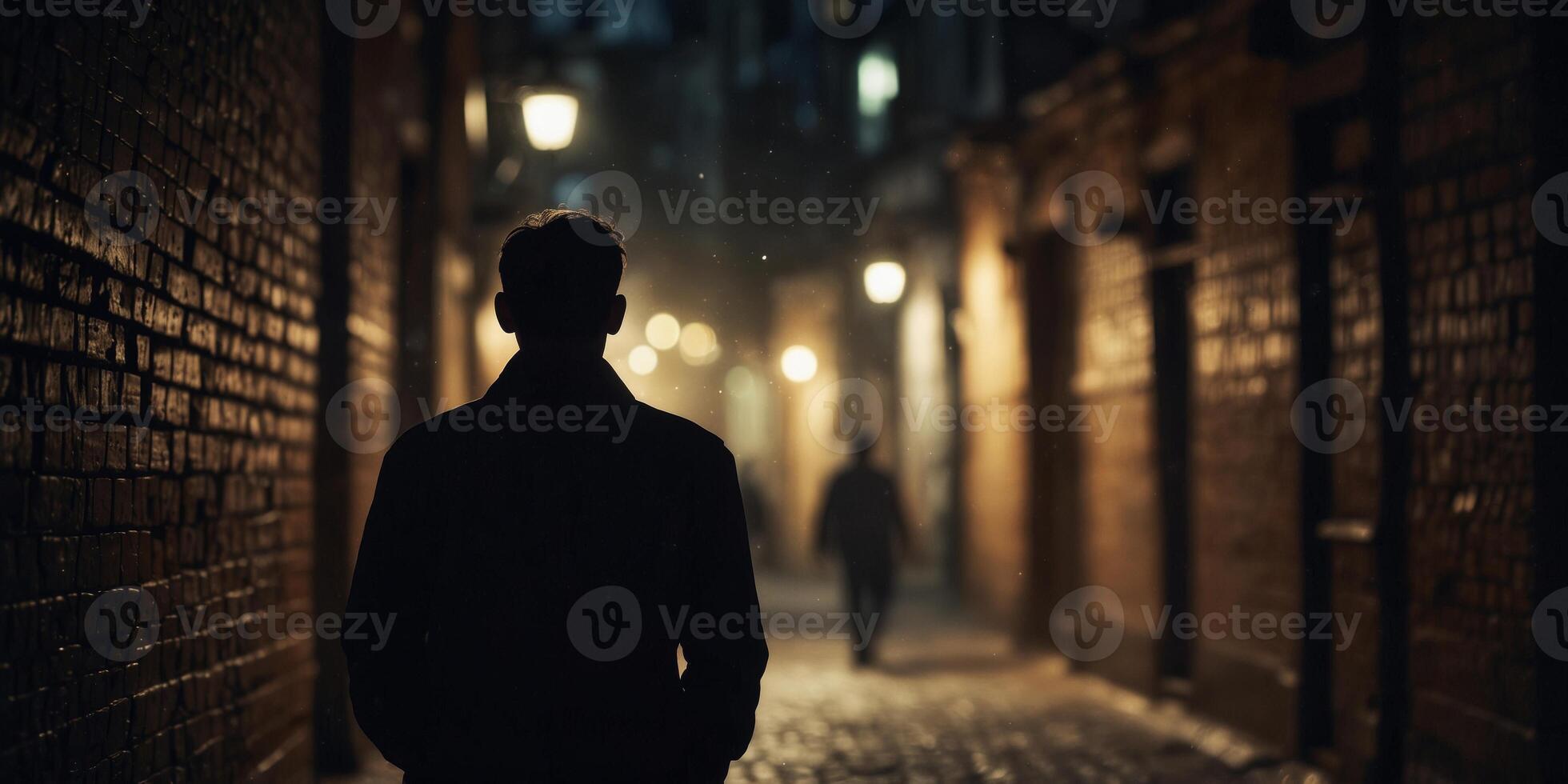 Mysterious silhouette walking through old city alley at night. photo