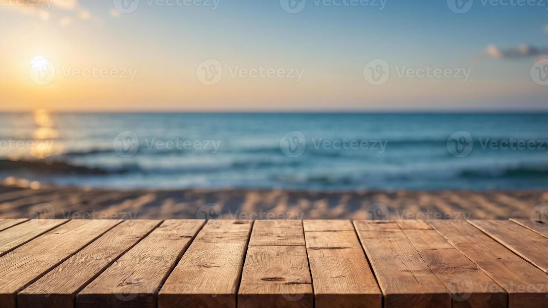 Wooden table with with blurry beach and ocean in background. photo