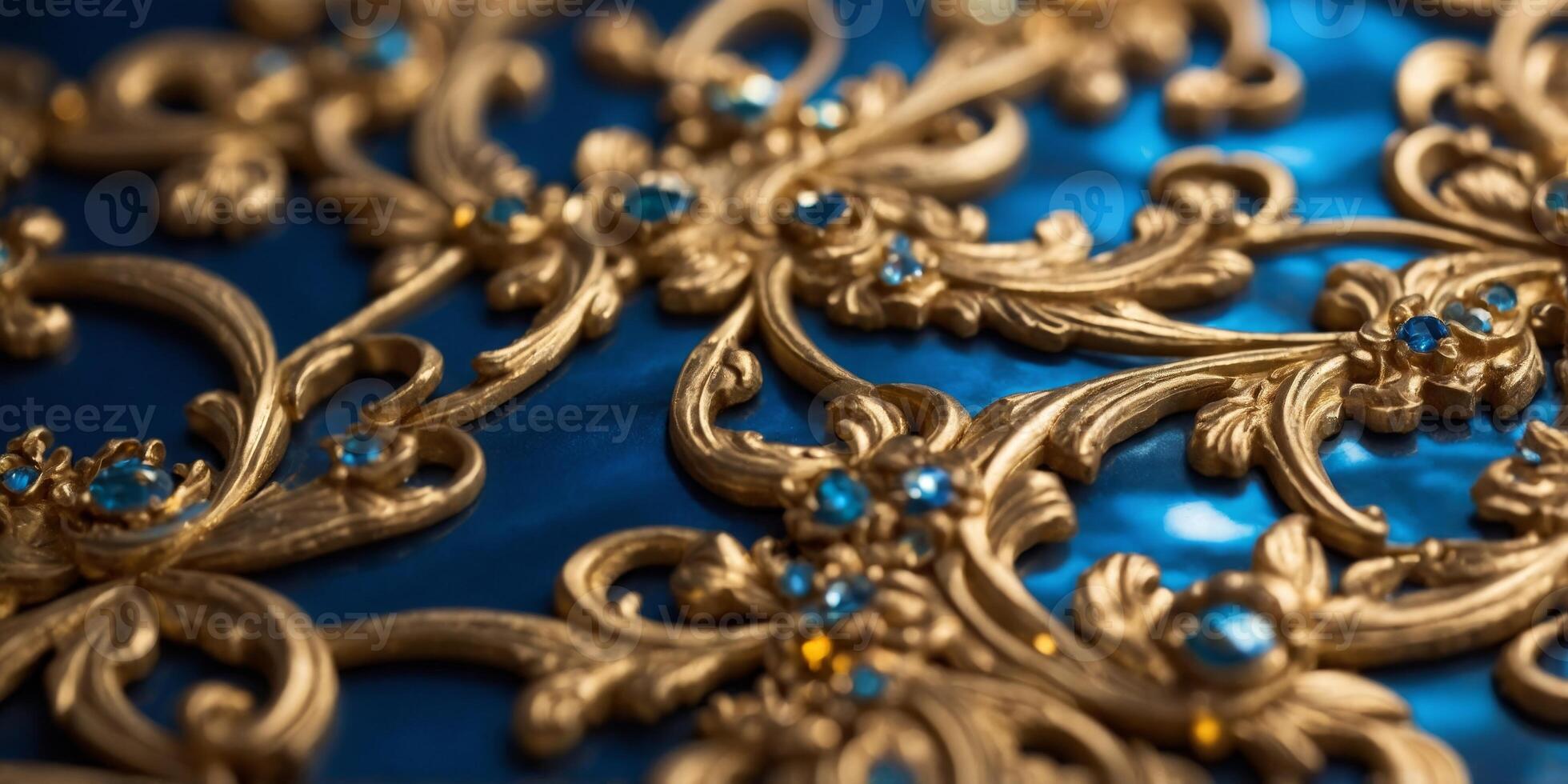 Close up of structured gold and blue baroque style wallpaper. photo