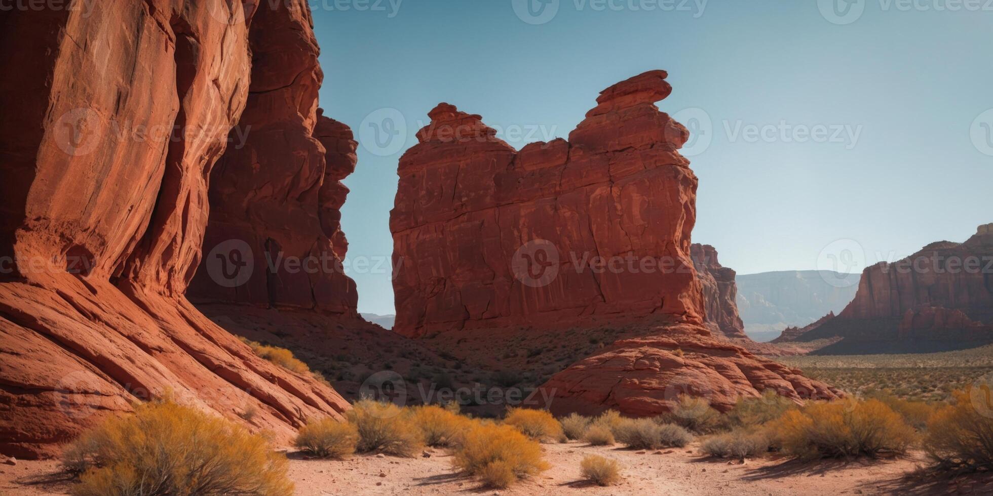 Layered red rock formations in a desert landscape. photo