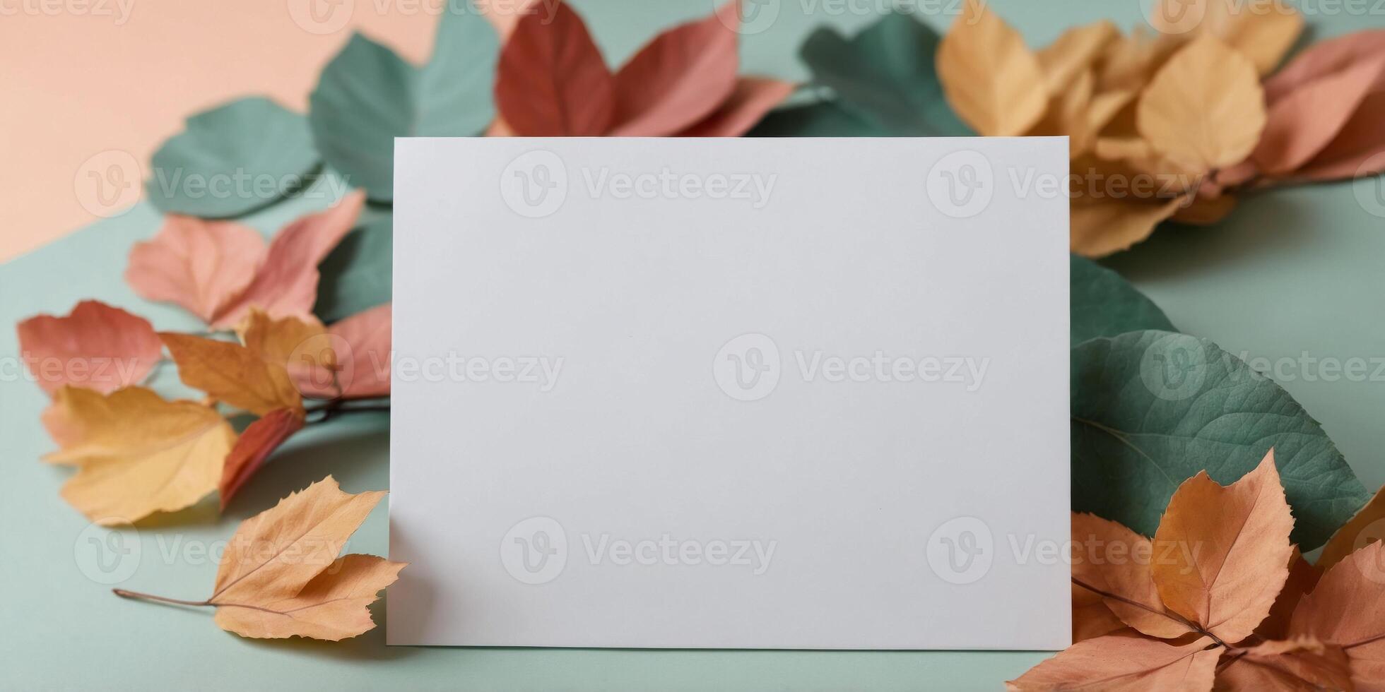 blank paper mock up with leaves on pastel background. photo