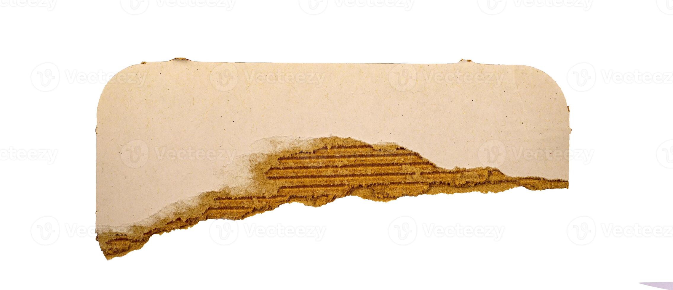 Torn white carton with a view of ribbed piece isolated on white background photo
