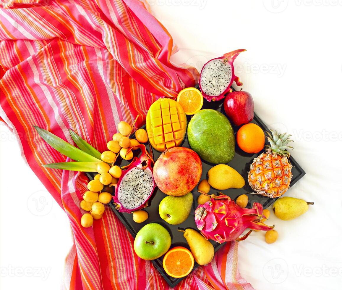 Exotic fruits on the tray photo