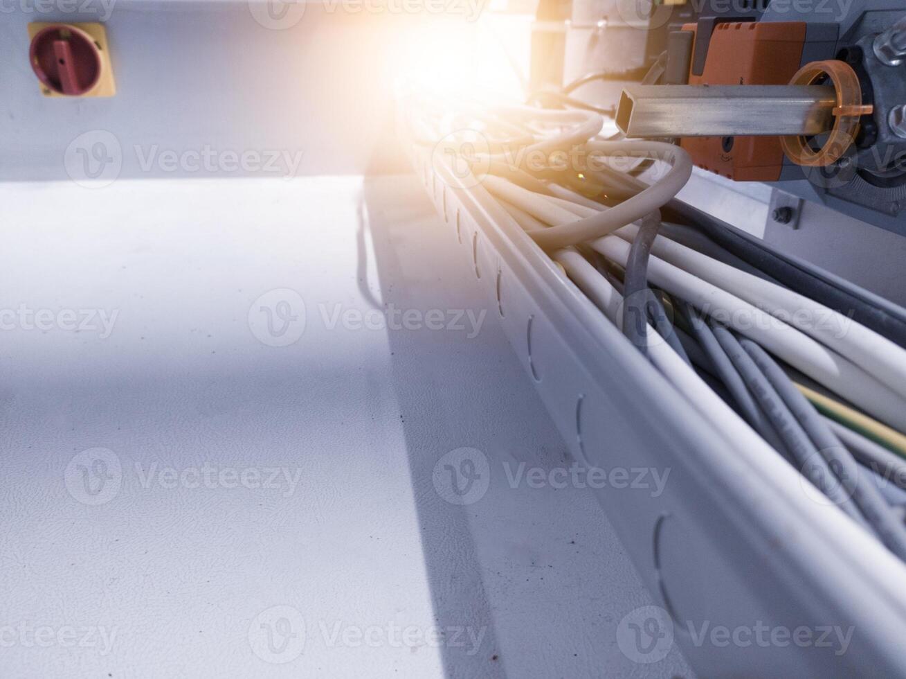 The wiring circuit path leads to the machine control panel. photo